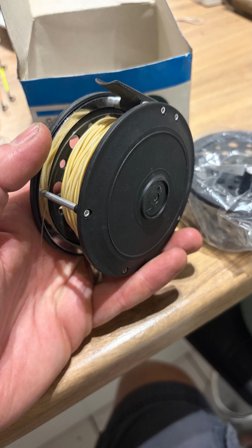 Side and rear view of Shakespeare fly reel