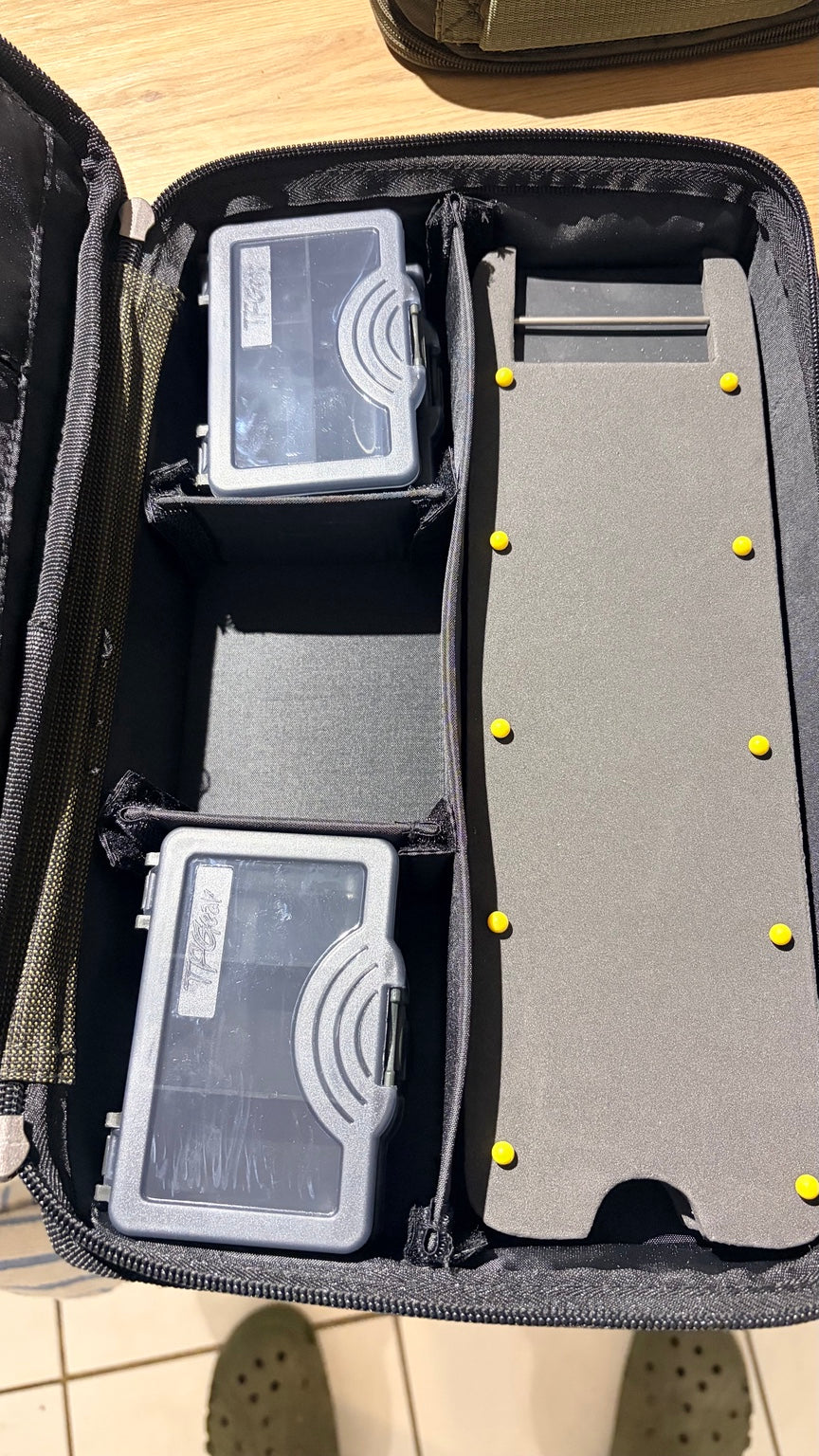 TF Gear Hardcore rig station interior with rig board and tackle boxes
