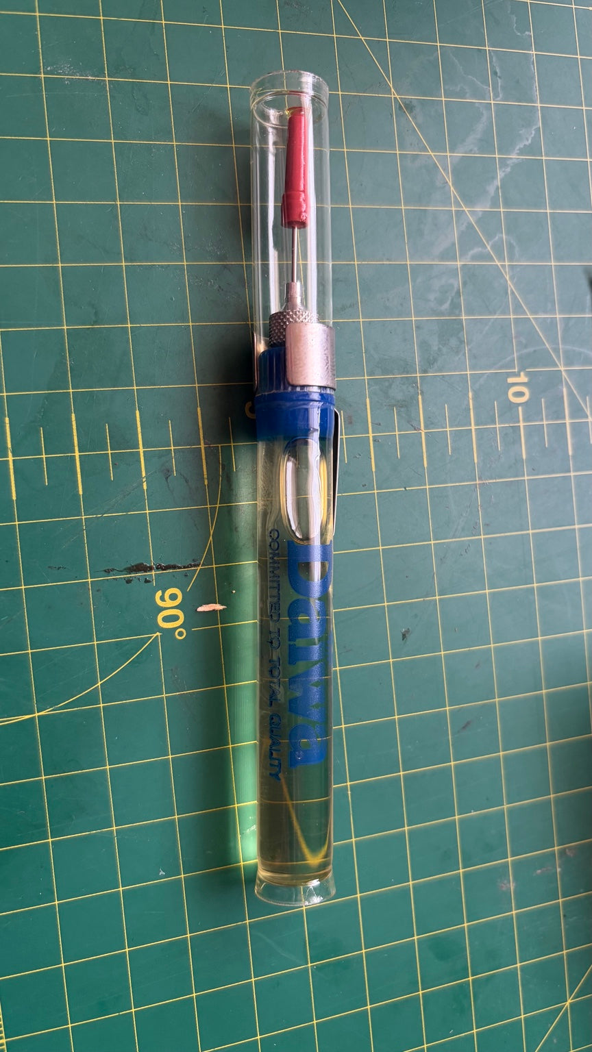 Vintage Daiwa reel oil precision oiler in clear protective tube